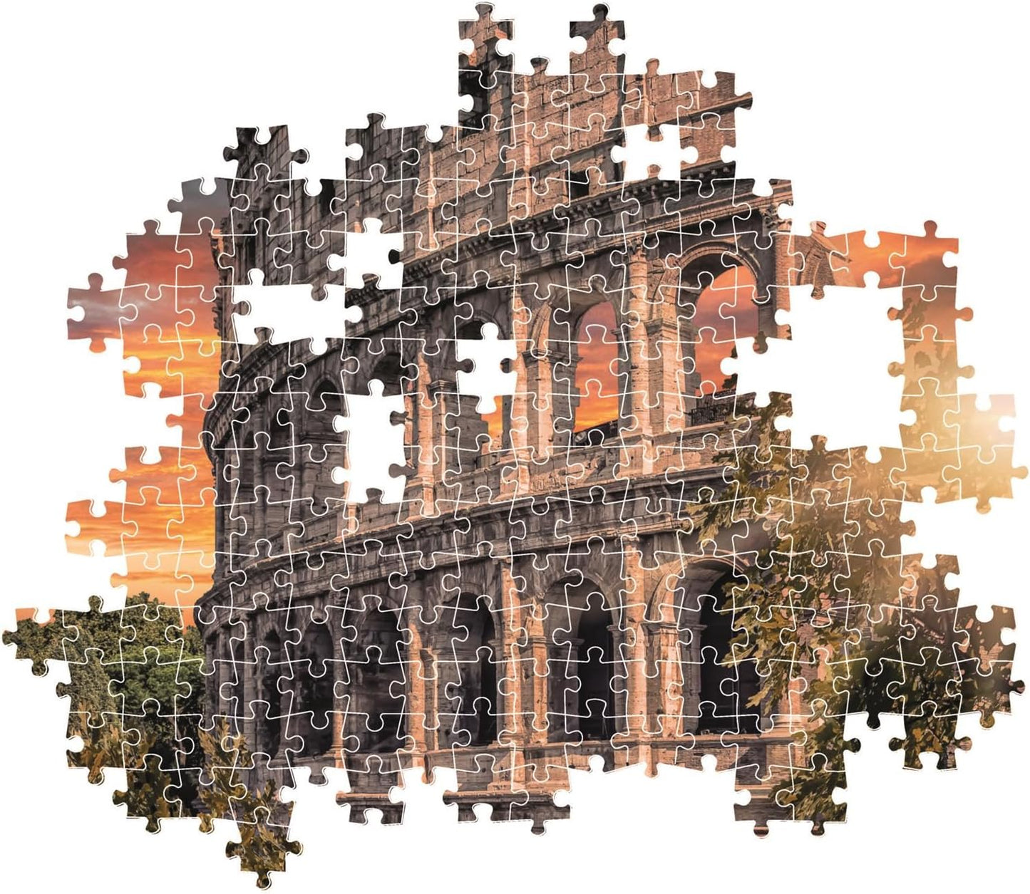 Montaje parcial del Puzzle Anfiteatro 500 piezas Clementoni, con piezas encajadas mostrando el Coliseo de Roma al atardecer y piezas sueltas alrededor.
