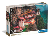 Caja del Puzzle El Nido del Tigre 500 piezas Clementoni. El monasterio budista de Paro Taktsang enclavado en un acantilado rocoso de Bután, rodeado de bosque y montañas.