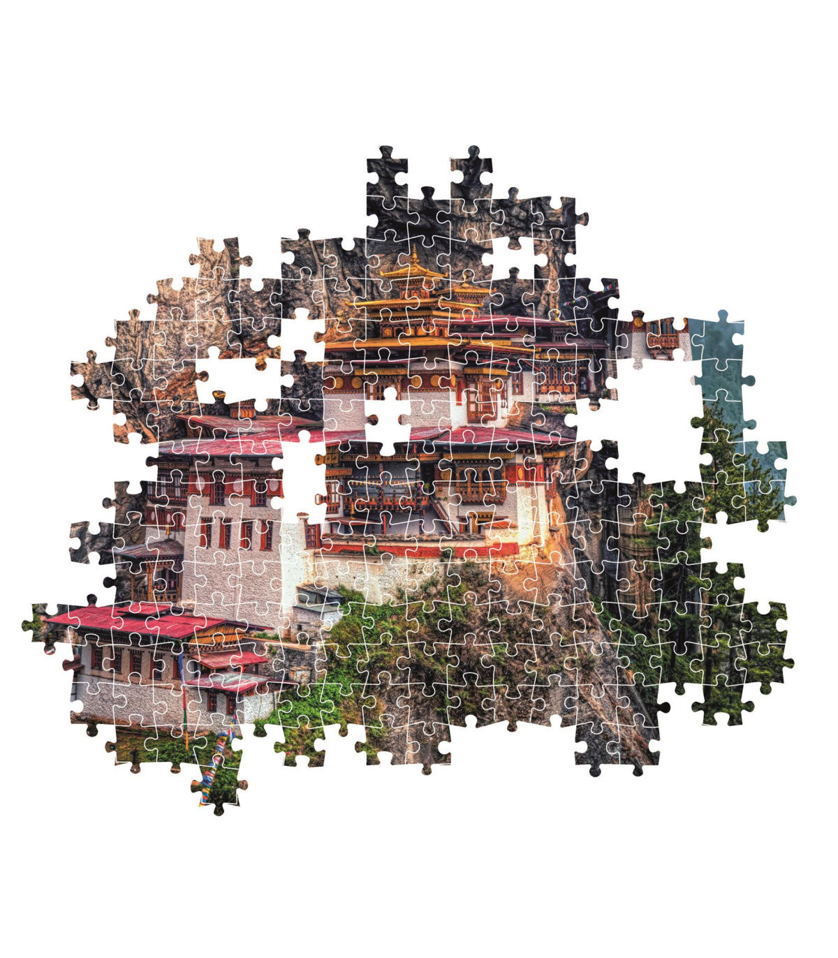 Montaje parcial del Puzzle El Nido del Tigre 500 piezas Clementoni, con piezas encajadas mostrando el monasterio de Paro Taktsang en el acantilado y piezas sueltas alrededor.
