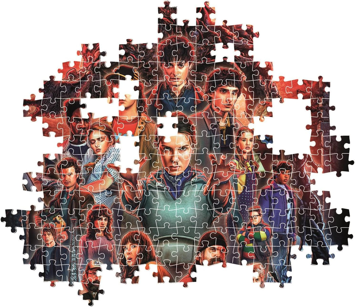 Montaje parcial del Puzzle Stranger Things Temporada 5 1000 piezas Clementoni, con piezas encajadas mostrando a Eleven y el resto de personajes, y piezas sueltas alrededor.
