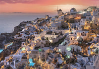 Ilustración del puzzle Santorini 1000 piezas Clementoni con las casas blancas encaladas y los molinos de Oía al atardecer sobre el mar Egeo
