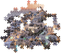 Montaje parcial del puzzle Santorini 1000 piezas Clementoni con piezas sueltas mostrando las casas blancas y el atardecer