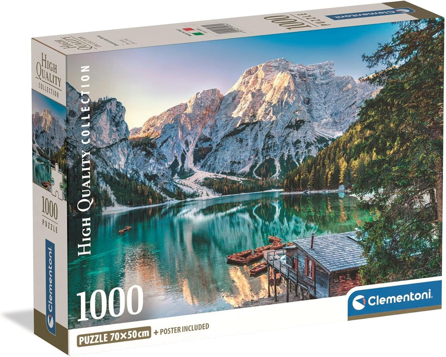Caja del puzzle Lago Esmeralda 1000 piezas Clementoni con un lago de aguas turquesa entre montañas alpinas, una cabaña de madera y barcas amarradas