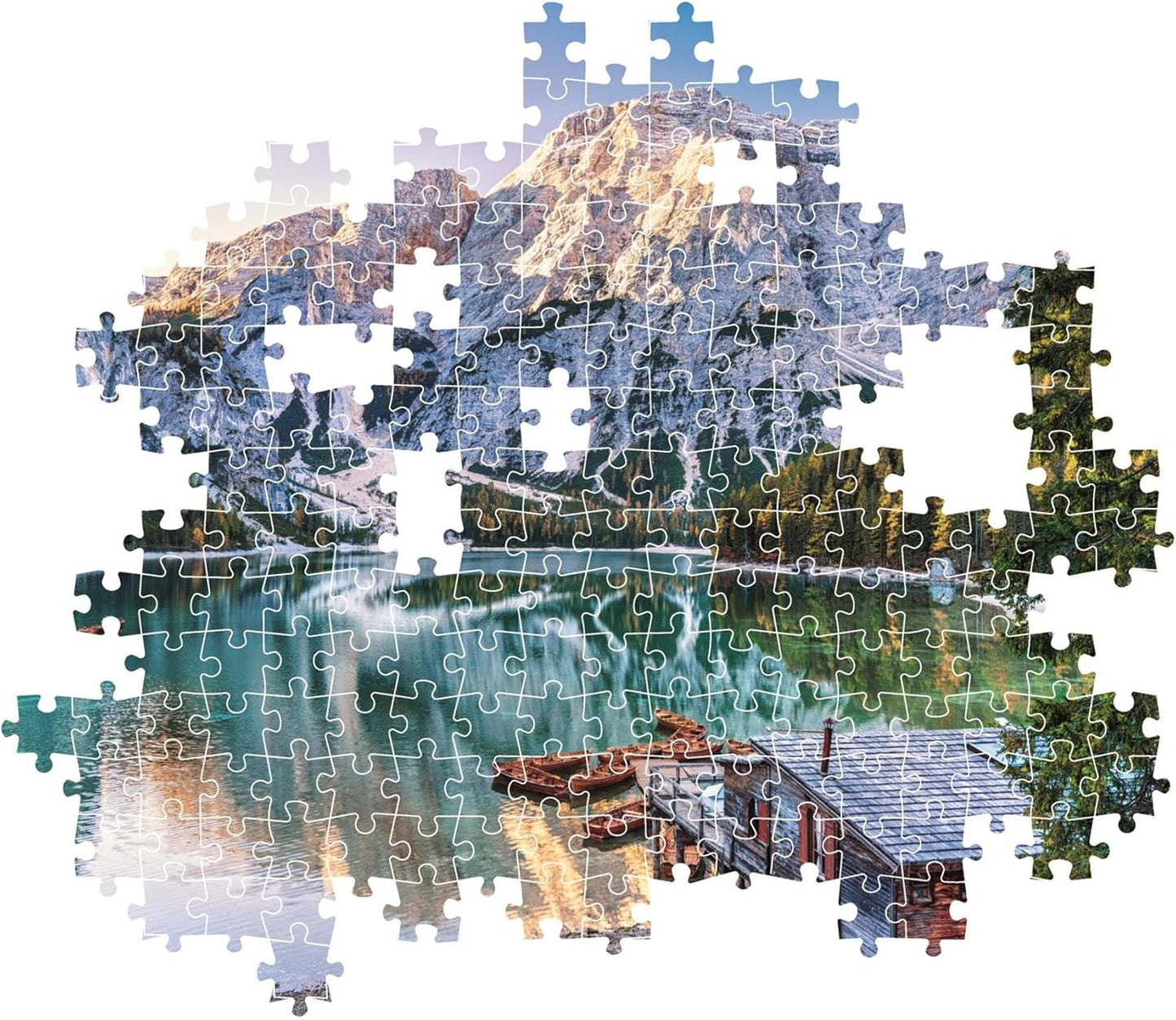 Montaje parcial del puzzle Lago Esmeralda 1000 piezas Clementoni con piezas sueltas mostrando el lago, las montañas y la cabaña