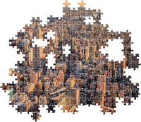 Montaje parcial del puzzle Nueva York 1000 piezas Clementoni con piezas sueltas mostrando los rascacielos de Manhattan
