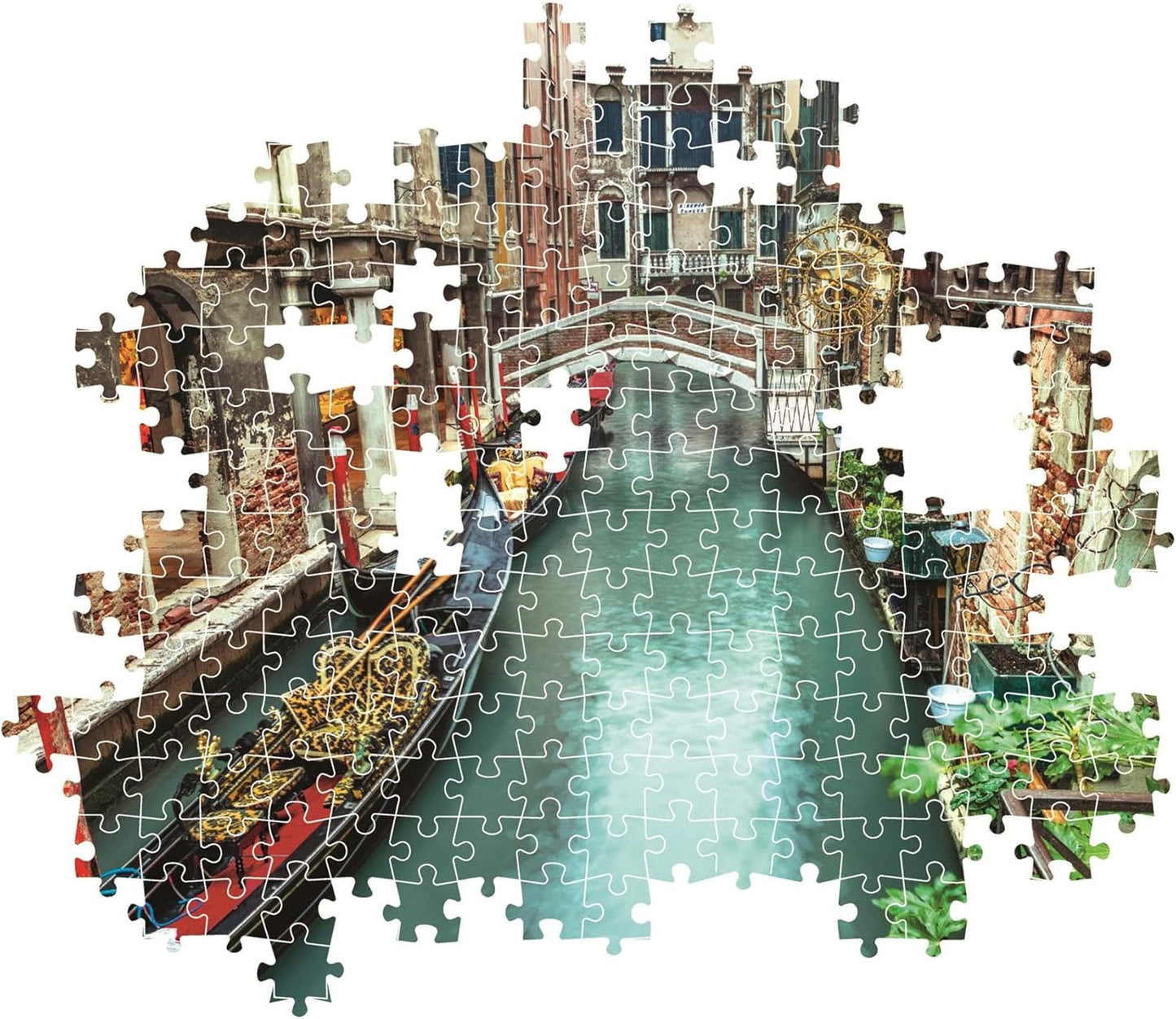 Montaje parcial del puzzle Canal de Venecia 1000 piezas Clementoni con piezas sueltas mostrando la góndola y el canal