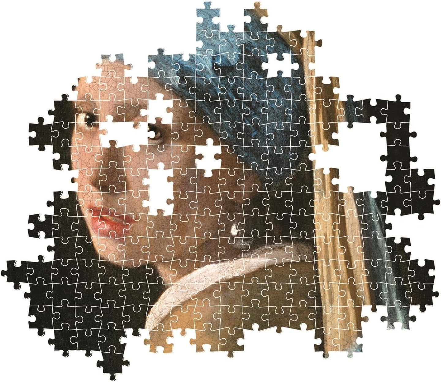 Montaje parcial del puzzle La Joven de la Perla 1000 piezas Clementoni, con piezas ensambladas del rostro y el turbante azul y piezas sueltas alrededor