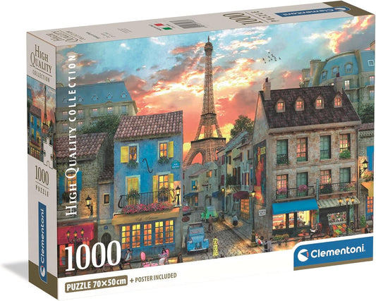 Caja del puzzle Calle de París 1000 piezas Clementoni con una calle empedrada, cafés y la Torre Eiffel al atardecer