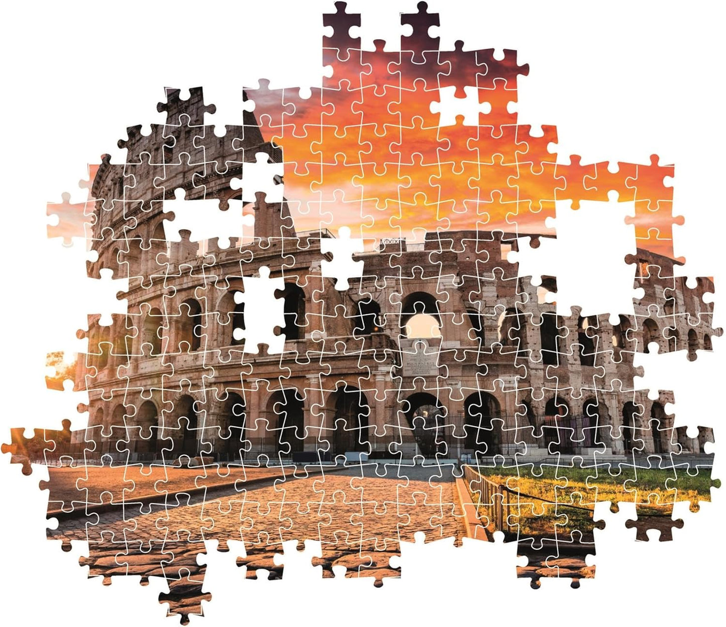 Montaje parcial del puzzle Atardecer en el Coliseo de Roma 1000 piezas Clementoni con piezas sueltas mostrando el Coliseo y el cielo del atardecer