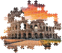 Montaje parcial del puzzle Atardecer en el Coliseo de Roma 1000 piezas Clementoni con piezas sueltas mostrando el Coliseo y el cielo del atardecer