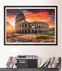 Puzzle Atardecer en el Coliseo de Roma 1000 piezas Clementoni montado y enmarcado en negro sobre pared, sobre un estante con cintas VHS y radio-casete vintage